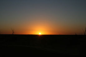 Foto: Sonnenuntergang über der Sahara in Tunesien